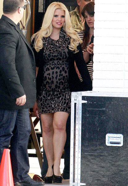 Jessica Simpson Emphasizes Growing Baby Bump in Skintight Leopard-Print Dress on the Set of Commercial Shoot